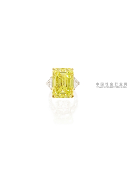 An Impressive Fancy Vivid Yellow Diamond and Diamond Ring .jpg