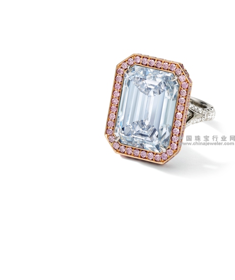 A Rare Fancy Blue Diamond and Diamond Ring.jpg