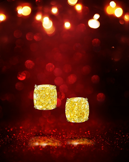 LOT 674 A Pair of Fancy Coloured Diamond Earstuds.jpg