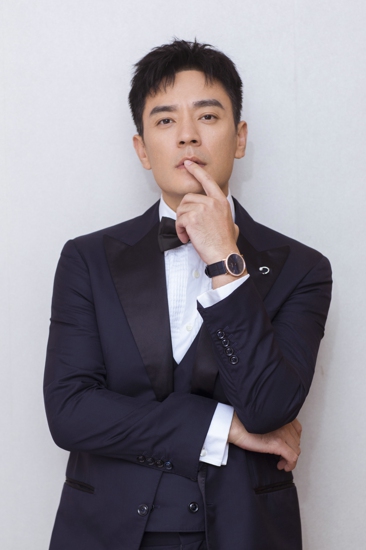 李光洁佩戴PIAGET伯爵亮相飞天奖颁奖典礼_2.jpg